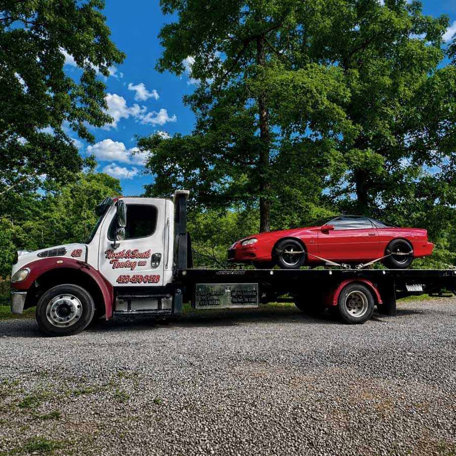 North and South Towing LLC Flatbed Tow Truck Towing Red Sports Car Cleveland Tennessee