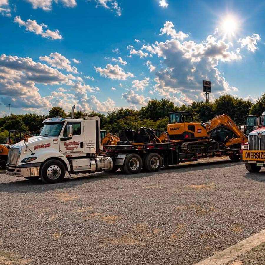 North and South Towing LLC Hauling Large Equipment on drop deck trailer Cleveland Tennessee