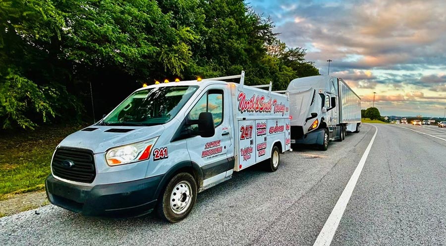 North and South Towing LLC Roadside Assistance Service Truck on Shoulder with tractor trailer Cleveland Tennessee